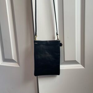 Clare V. Phone carrier in black leather